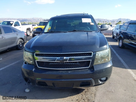 2012 Chevrolet Suburban LT with VIN 1GNSCJE00CR226285, listed as a IAAI auction lot 42059936 with 318,948 mi miles. Bid and sale history available at carsss.com. Image 12.