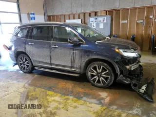 2020 Honda Pilot Touring 7-Passenger z VIN 5FNYF6H67LB031880, wystawiony jako Copart lot #46083925 z przebiegiem 59 729 mil mil oraz Szkoda całkowita • Salvage title. Historia ofert i sprzedaży dostępna na DreamBid. Obrazek 4.