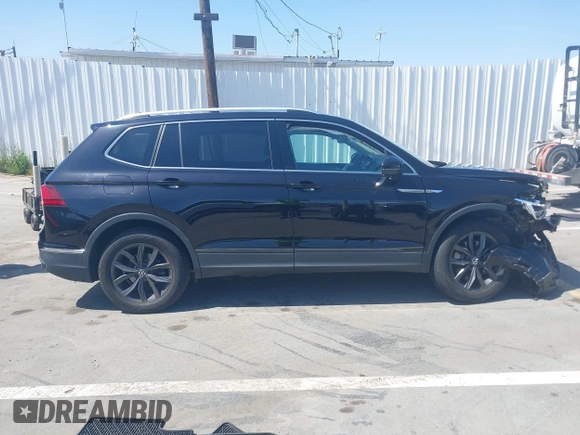 2022 Volkswagen Tiguan SE with VIN 3VV3B7AX3NM016534, listed as a IAAI auction lot 42354264 with 33,700 mi miles and . Bid and sale history available at DreamBid. Image 13.