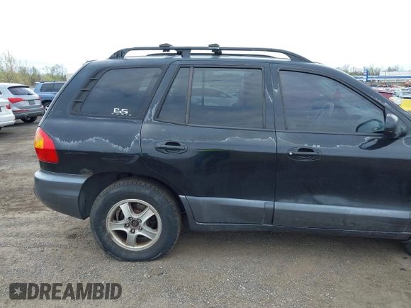 2004 Hyundai Santa Fe GLS with VIN KM8SC73D54U714336, listed as a IAAI auction lot 42079721 with 104,751 mi miles. Bid and sale history available at carsss.com. Image 14.