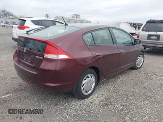 2011 Honda Insight LX z VIN JHMZE2H52BS004304, wystawiony jako IAAI lot #41827541 z przebiegiem 141 072 mil mil oraz . Historia ofert i sprzedaży dostępna na DreamBid. Obrazek 4.