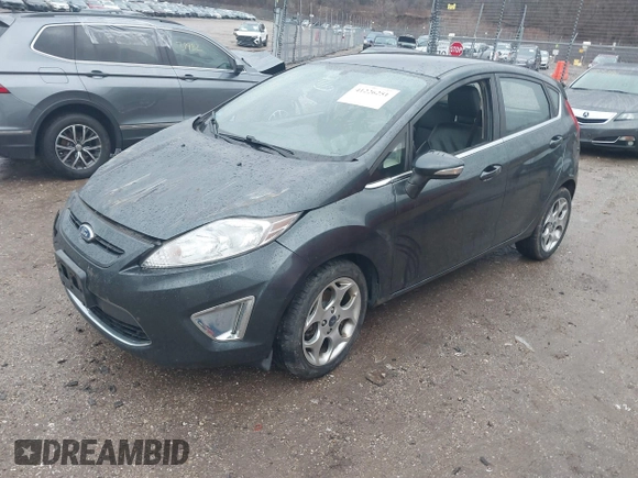 2011 Ford Fiesta SES with VIN 3FADP4FJ7BM111381, listed as a IAAI auction lot 41226251 with 93,694 mi miles. Bid and sale history available at carsss.com. Image 16.
