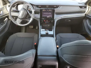 2025 Jeep Grand Cherokee Laredo with VIN 1C4RJHAG0SC268997, listed as a Copart auction lot 45860945 with 1,036 mi miles and Salvage Title. Bid and sale history available at DreamBid. Image 8.