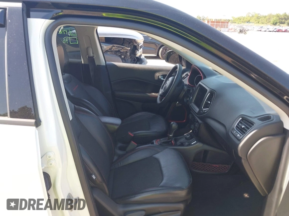 2021 Jeep Compass Trailhawk with VIN 3C4NJDDB7MT564467, listed as a IAAI auction lot 42330939 with 76,963 mi miles and . Bid and sale history available at DreamBid. Image 5.