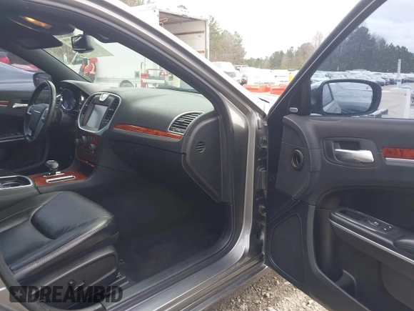 2012 Chrysler 300 Limited with VIN 2C3CCACG4CH308408, listed as a IAAI auction lot 41734589 with 135,813 mi miles. Bid and sale history available at carsss.com. Image 5.