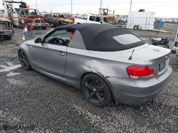 2009 BMW 1 Series 135i with VIN WBAUN93599VK40515, listed as a IAAI auction lot 41144493 with 161,676 mi miles. Bid and sale history available at carsss.com. Image 3.