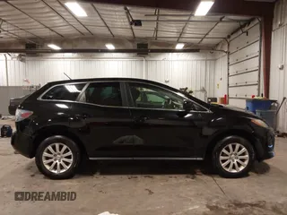 2011 Mazda CX-7 i Sport z VIN JM3ER2B54B0355683, wystawiony jako IAAI lot #42153260 z przebiegiem 238 786 mil mil oraz . Historia ofert i sprzedaży dostępna na DreamBid. Obrazek 14.