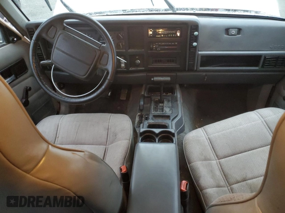 1996 Jeep Cherokee Sport with VIN 1J4FJ68S9TL284984, listed as a Copart auction lot 86307644 with 136,142 mi miles and Salvage Title. Bid and sale history available at carsss.com. Image 8.