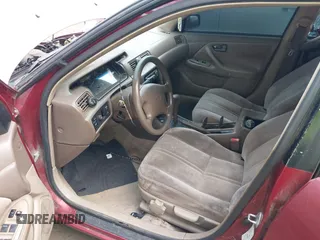 1997 Toyota Camry LE z VIN 4T1BG22K3VU090917, wystawiony jako IAAI lot #42174600 z przebiegiem 213 850 mil mil oraz . Historia ofert i sprzedaży dostępna na DreamBid. Obrazek 5.