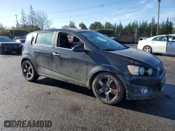 2012 Chevrolet Sonic LTZ z VIN 1G1JE6SH2C4126197, wystawiony jako Copart lot #85541214 z przebiegiem Nie podano mil oraz Szkoda całkowita • Salvage title. Historia ofert i sprzedaży dostępna na DreamBid. Obrazek 4.