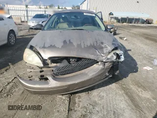 2003 Ford Taurus SEL Deluxe with VIN 1FAHP56SX3A243775, listed as a Copart auction lot 72245394 with 251,041 mi miles and Salvage Title. Bid and sale history available at DreamBid. Image 5.