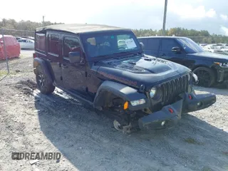 2021 Jeep Wrangler Unlimited Rubicon with VIN 1C4HJXFN0MW713057, listed as a IAAI auction lot 41773485 with 52,480 mi miles. Bid and sale history available at carsss.com. Image 1.