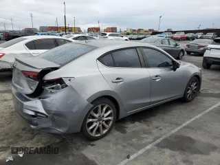 2014 Mazda 3 S Touring with VIN JM1BM1V31E1107453, listed as a Copart auction lot 48769215 with 145,346 mi miles and Salvage Title. Bid and sale history available at DreamBid. Image 3.