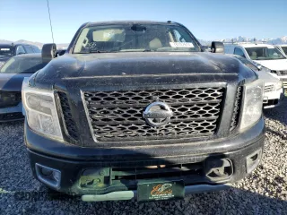 2017 Nissan Titan SV z VIN 1N6AA1E54HN541544, wystawiony jako Copart lot #78107674 z przebiegiem 201 670 mil mil oraz Czysty tytuł • Clean title. Historia ofert i sprzedaży dostępna na DreamBid. Obrazek 5.