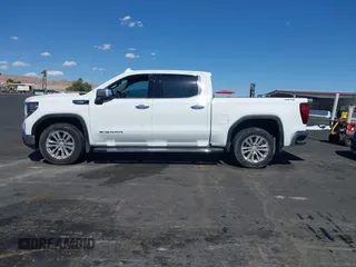 2023 GMC Sierra 1500 SLT z VIN 3GTUUDE86PG103392, wystawiony jako IAAI lot #42272800 z przebiegiem 25 545 mil mil oraz . Historia ofert i sprzedaży dostępna na DreamBid. Obrazek 14.