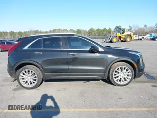 2021 Cadillac XT4 FWD Luxury with VIN 1GYAZAR46MF074767, listed as a IAAI auction lot 41652091 with 46,631 mi miles and . Bid and sale history available at DreamBid. Image 13.
