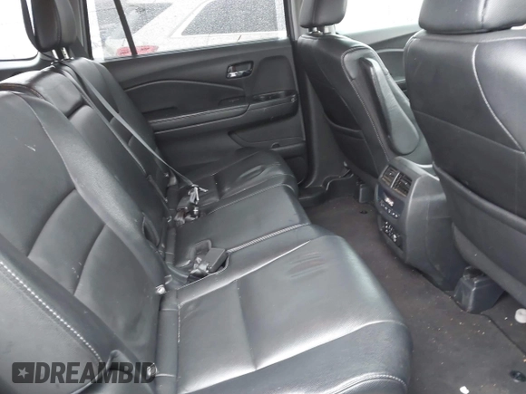 2017 Honda Pilot EX-L with VIN 5FNYF5H8XHB018480, listed as a IAAI auction lot 41049028 with 136,748 mi miles and . Bid and sale history available at DreamBid. Image 8.