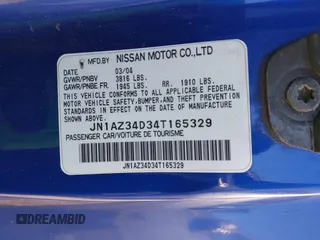 2004 Nissan 350Z Touring with VIN JN1AZ34D34T165329, listed as a IAAI auction lot 41872788 with 199,196 mi miles. Bid and sale history available at carsss.com. Image 9.