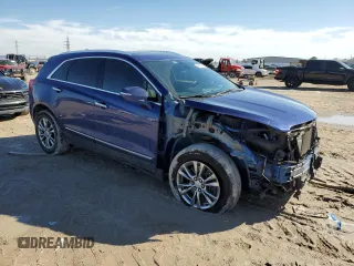 2023 Cadillac XT5 FWD Premium Luxury with VIN 1GYKNCRS3PZ154122, listed as a Copart auction lot 43063675 with 52,279 mi miles and Salvage Title. Bid and sale history available at carsss.com. Image 4.
