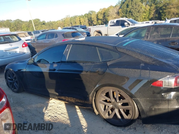 2021 Tesla Model S Plaid with VIN 5YJSA1E62MF451785, listed as a IAAI auction lot 40520806 with 31,084 mi miles. Bid and sale history available at carsss.com. Image 14.