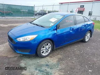 2018 Ford Focus SE z VIN 1FADP3F29JL235302, wystawiony jako IAAI lot #42262964 z przebiegiem 85 127 mil mil oraz . Historia ofert i sprzedaży dostępna na DreamBid. Obrazek 17.