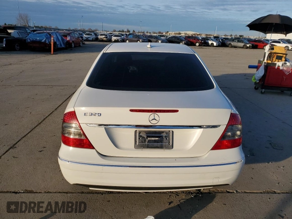 2009 Mercedes-Benz E-Class Sport 5.5L with VIN WDBUF72X79B376679, listed as a Copart auction lot 87035824 with 0 mi miles and Salvage Title. Bid and sale history available at carsss.com. Image 6.