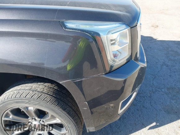2015 GMC Yukon XL Denali with VIN 1GKS2JKJ9FR634771, listed as a IAAI auction lot 41676218 with 73,271 mi miles. Bid and sale history available at carsss.com. Image 6.