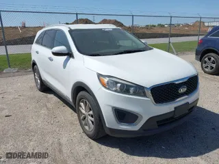 2016 Kia Sorento LX with VIN 5XYPGDA57GG135377, listed as a IAAI auction lot 42026641 with 153,799 mi miles. Bid and sale history available at carsss.com. Image 1.