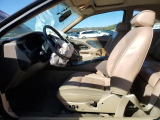 1997 Ford Thunderbird LX z VIN 1FALP62W9VH112212, wystawiony jako Copart lot #75232034 z przebiegiem 138 666 mil mil oraz Szkoda całkowita • Salvage title. Historia ofert i sprzedaży dostępna na DreamBid. Obrazek 7.
