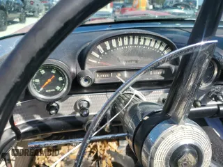 1955 Ford Thunderbird with VIN P5FH132340, listed as a Copart auction lot 77734424 with 96,568 mi miles and Salvage Title. Bid and sale history available at DreamBid. Image 9.