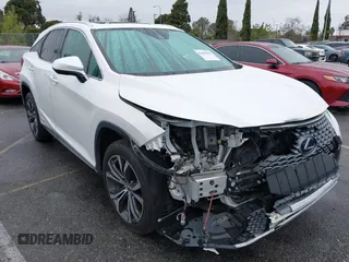 2020 Lexus RX with VIN 2T2HGMDA1LC052493, listed as a IAAI auction lot 41450535 with 63,547 mi miles. Bid and sale history available at carsss.com. Image 1.