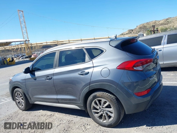 2018 Hyundai Tucson SEL with VIN KM8J3CA42JU618764, listed as a IAAI auction lot 41677046 with 127,980 mi miles. Bid and sale history available at carsss.com. Image 14.