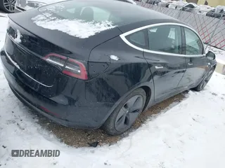 2018 Tesla Model 3 Long Range Battery with VIN 5YJ3E1EA2JF071855, listed as a IAAI auction lot 41314974 with 169,318 mi miles and . Bid and sale history available at DreamBid. Image 4.