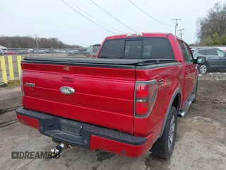 2011 Ford F-150 XLT with VIN 1FTFW1ET6BFD33921, listed as a IAAI auction lot 41821721 with 142,576 mi miles. Bid and sale history available at carsss.com. Image 4.