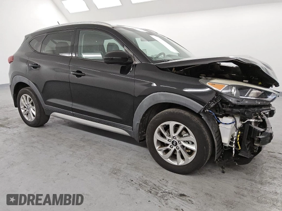 2017 Hyundai Tucson SE with VIN KM8J33A40HU351912, listed as a Copart auction lot 85588694 with 78,209 mi miles and Clean Title. Bid and sale history available at DreamBid. Image 4.