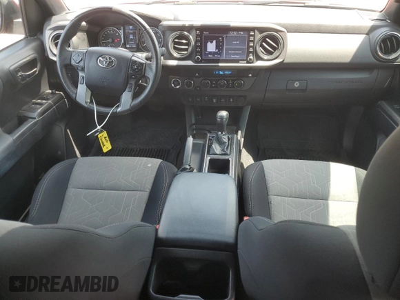 2021 Toyota Tacoma SR with VIN 3TMCZ5AN4MM394406, listed as a Copart auction lot 62268025 with 110,891 mi miles and Salvage title. Bid and sale history available at DreamBid. Image 8.