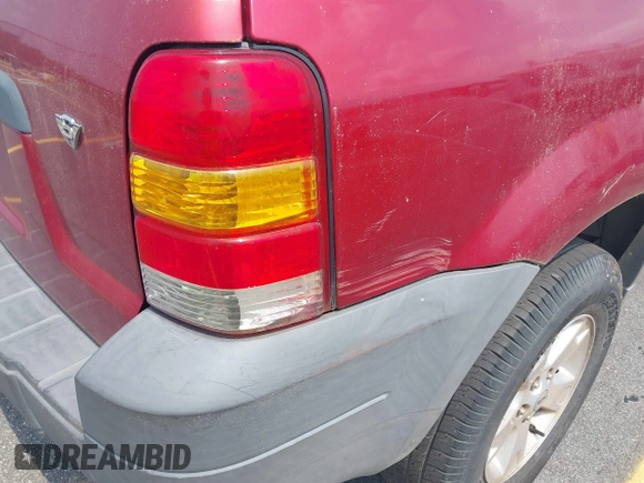 2006 Ford Escape XLT with VIN 1FMYU03136KD09448, listed as a IAAI auction lot 42578120 with 235,521 mi miles and . Bid and sale history available at DreamBid. Image 12.
