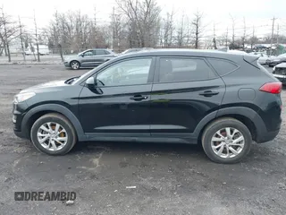 2019 Hyundai Tucson SE with VIN KM8J2CA47KU895799, listed as a IAAI auction lot 41141493 with 44,765 mi miles. Bid and sale history available at carsss.com. Image 14.