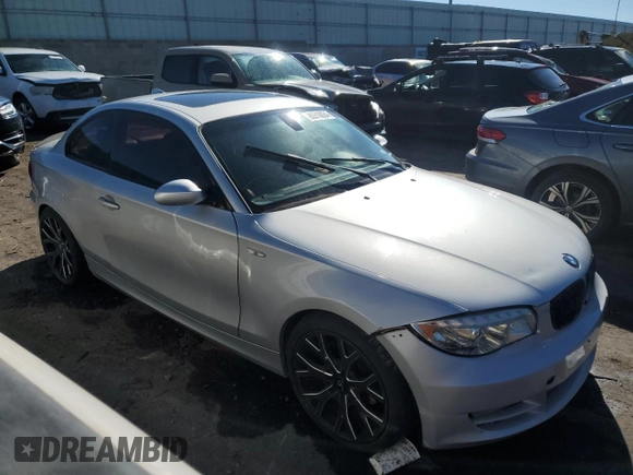 2009 BMW 1 Series 128i with VIN WBAUP93529VF48915, listed as a Copart auction lot 80310034 with 143,208 mi miles and Salvage title. Bid and sale history available at DreamBid. Image 4.