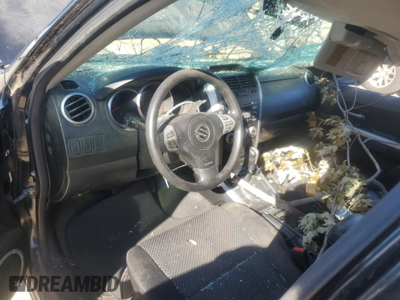 2007 Suzuki Grand Vitara z VIN JS3TE941X74202046, wystawiony jako Copart lot #80221394 z przebiegiem 153 791 mil mil oraz Szkoda całkowita • Salvage title. Historia ofert i sprzedaży dostępna na DreamBid. Obrazek 8.