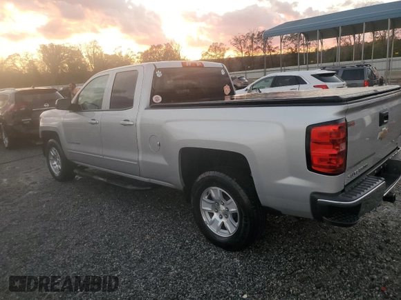 2015 Chevrolet Silverado 1500 LT with VIN 1GCRCREC1FZ431764, listed as a Copart auction lot 80342874 with 143,658 mi miles and Salvage Title. Bid and sale history available at DreamBid. Image 2.