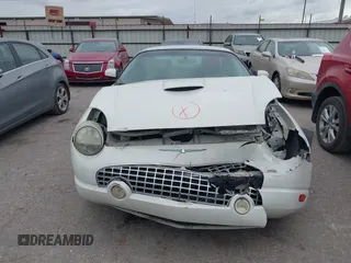 2002 Ford Thunderbird w/Hardtop Premium with VIN 1FAHP60A62Y127579, listed as a IAAI auction lot 42035019 with 98,582 mi miles. Bid and sale history available at carsss.com. Image 12.