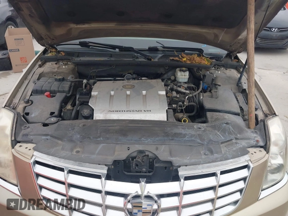 2006 Cadillac DTS 1SC z VIN 1G6KD57Y56U102470, wystawiony jako IAAI lot #40758530 z przebiegiem 149 330 mil mil oraz . Historia ofert i sprzedaży dostępna na DreamBid. Obrazek 10.