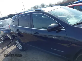 2015 Jeep Cherokee North with VIN 1C4PJMCS4FW792918, listed as a IAAI auction lot 41748651 with 107,034 mi miles. Bid and sale history available at carsss.com. Image 14.