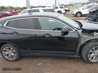 2022 BMW X2 xDrive28i with VIN WBXYJ1C01N5U20171, listed as a IAAI auction lot 41284932 with 64,256 mi miles. Bid and sale history available at carsss.com. Image 14.