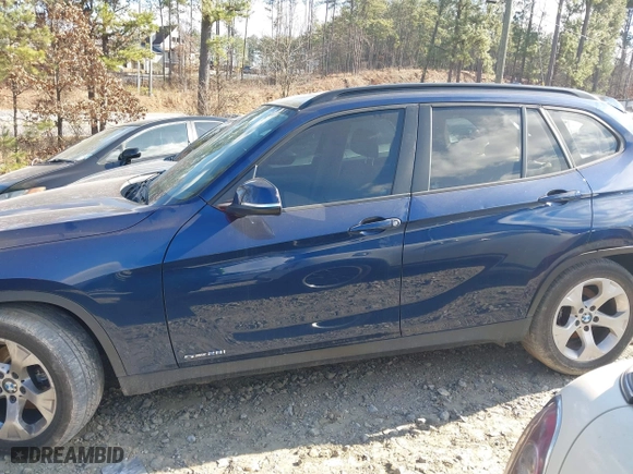 2013 BMW X1 28i with VIN WBAVM1C52DVW46153, listed as a IAAI auction lot 41236419 with 160,732 mi miles. Bid and sale history available at carsss.com. Image 14.