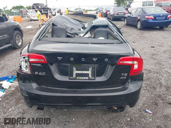 2016 Volvo S60 T5 Premier z VIN YV1612TK3G2411949, wystawiony jako IAAI lot #42353357 z przebiegiem 152 937 mil mil oraz . Historia ofert i sprzedaży dostępna na DreamBid. Obrazek 15.