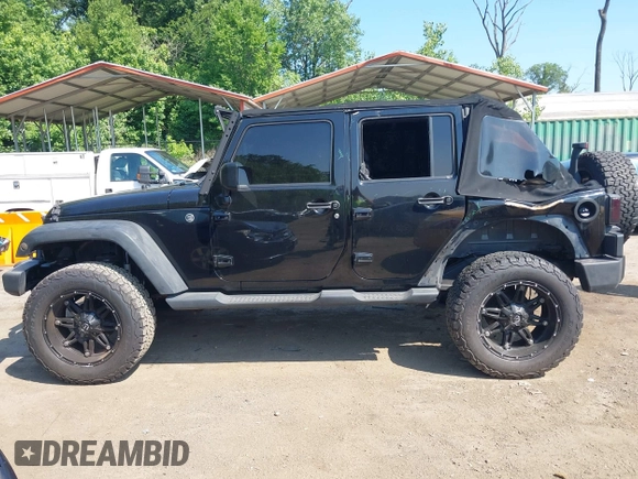 2015 Jeep Wrangler Unlimited Sport with VIN 1C4BJWDG2FL518487, listed as a IAAI auction lot 42593022 with 161,991 mi miles and . Bid and sale history available at DreamBid. Image 14.