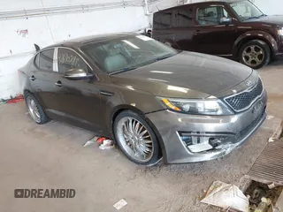 2015 Kia Optima EX with VIN 5XXGN4A73FG372426, listed as a IAAI auction lot 42630287 with 154,060 mi miles and . Bid and sale history available at DreamBid. Image 1.