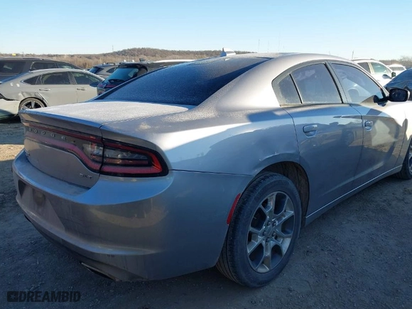 2016 Dodge Charger SXT with VIN 2C3CDXJG8GH281884, listed as a IAAI auction lot 41413437 with 115,548 mi miles. Bid and sale history available at carsss.com. Image 4.